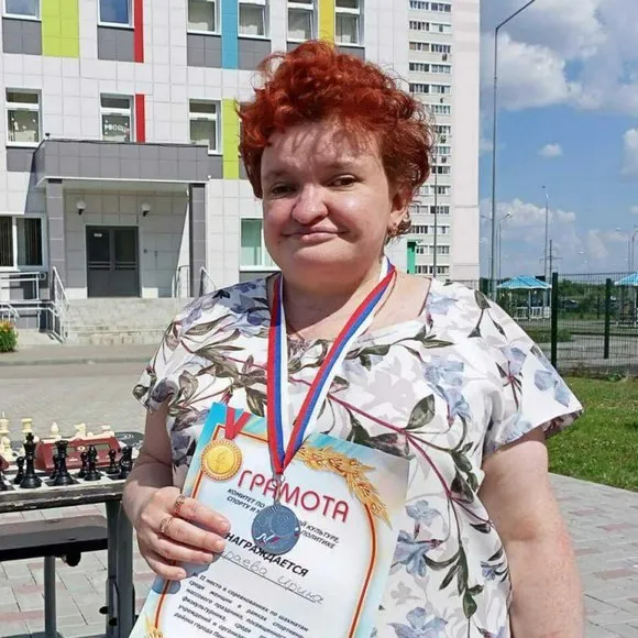 Ирина Караева профессиональная шахматистка, искривление позвоночника